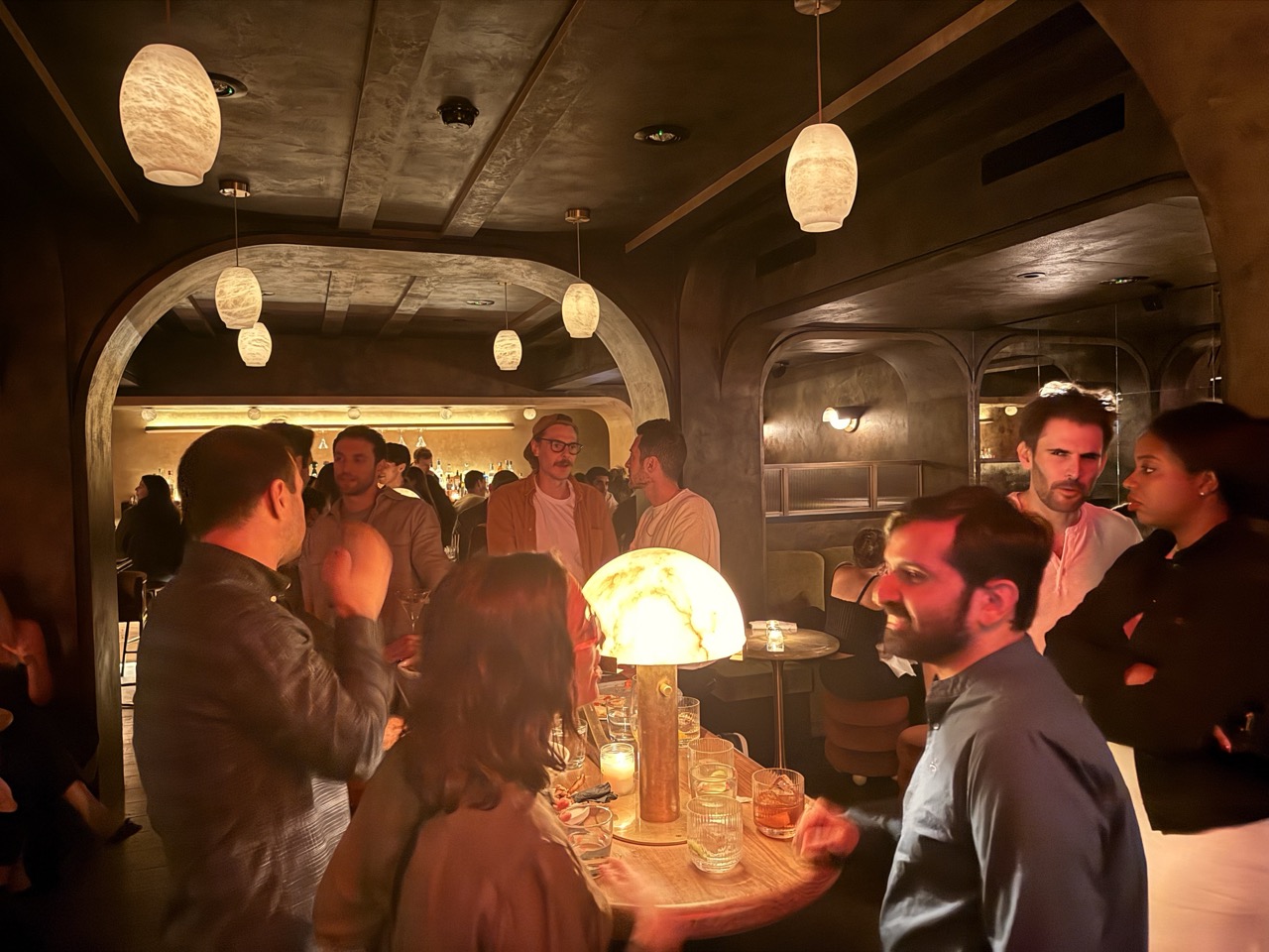 Socializing in New York. Photo by Derek Cutting.